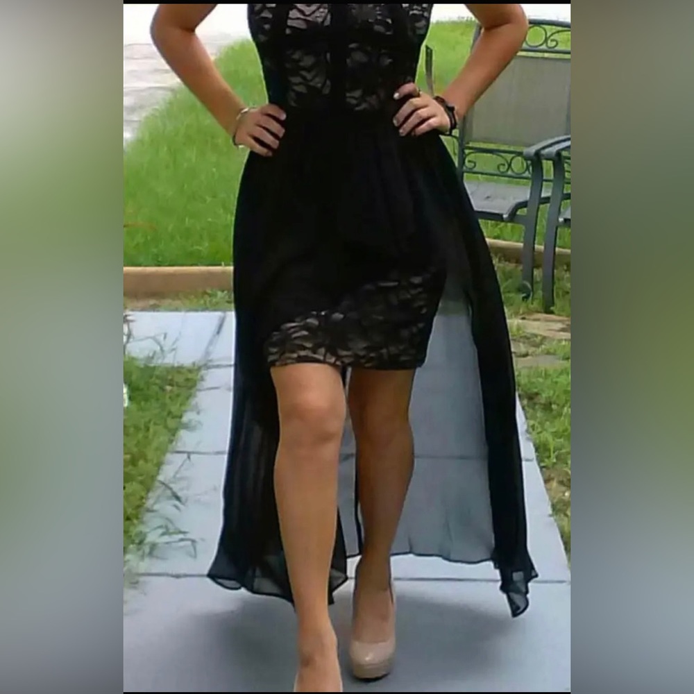 Prom dress, worn once, not eaten or drank in. Practically brand new.